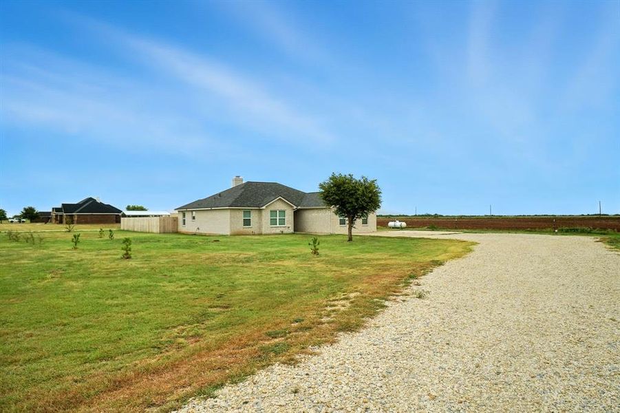 Front exterior of a new home in , Hawley, TX, highlighting curb appeal (Image 20).