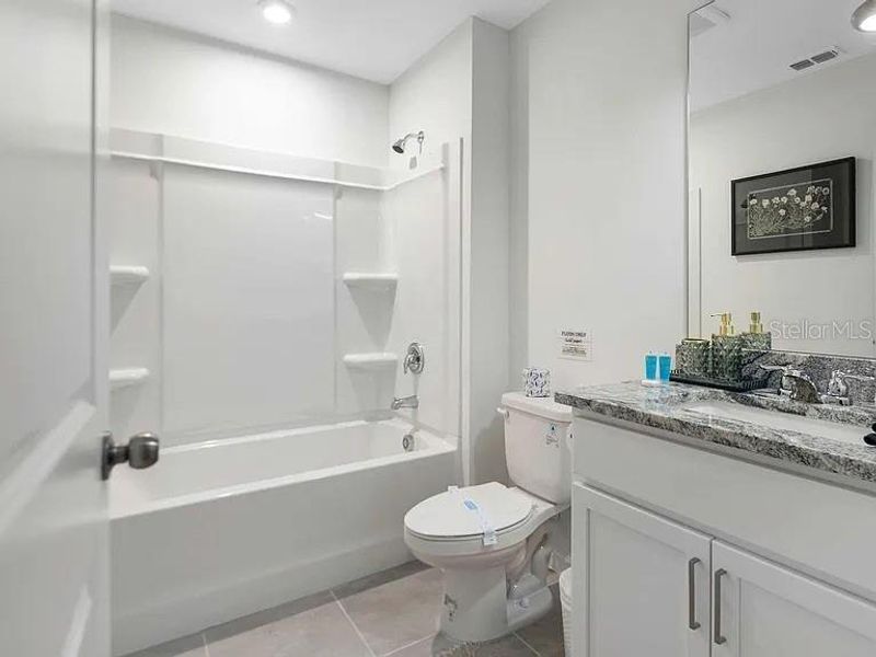 Furnished interior view inside a new home in , Kissimmee (Image 7).