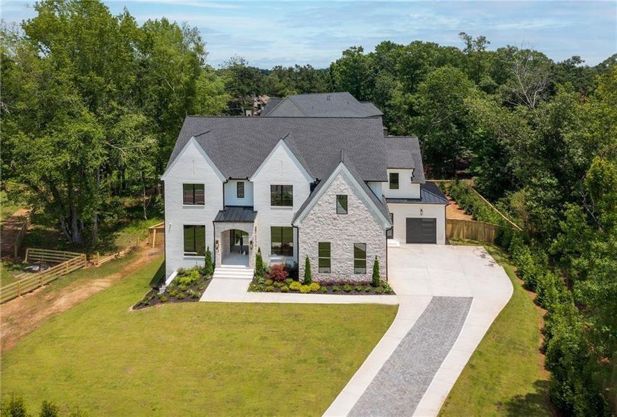 Front exterior of a new home in , Alpharetta, GA, highlighting curb appeal (Image 30).