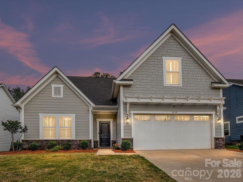 Front exterior of a new home in , Monroe, NC, highlighting curb appeal (Image 23).