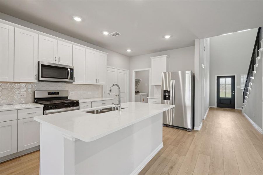 Photo is not of the actual home, but is an inspirational photo of builder’s model home and may depict options, furnishings, and/or decorator features that are not included.