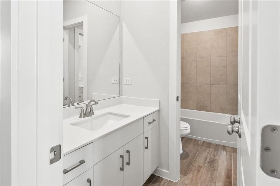 Furnished interior view inside a new home in Trace, San Marcos (Image 15).