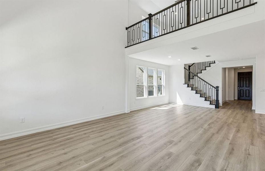 Open concept gathering room creating a spacious and inviting atmosphere Open concept gathering room creating a spacious and inviting atmosphere