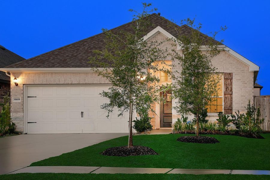 Front exterior of a new home in Mavera, Conroe, TX, highlighting curb appeal (Image 19).