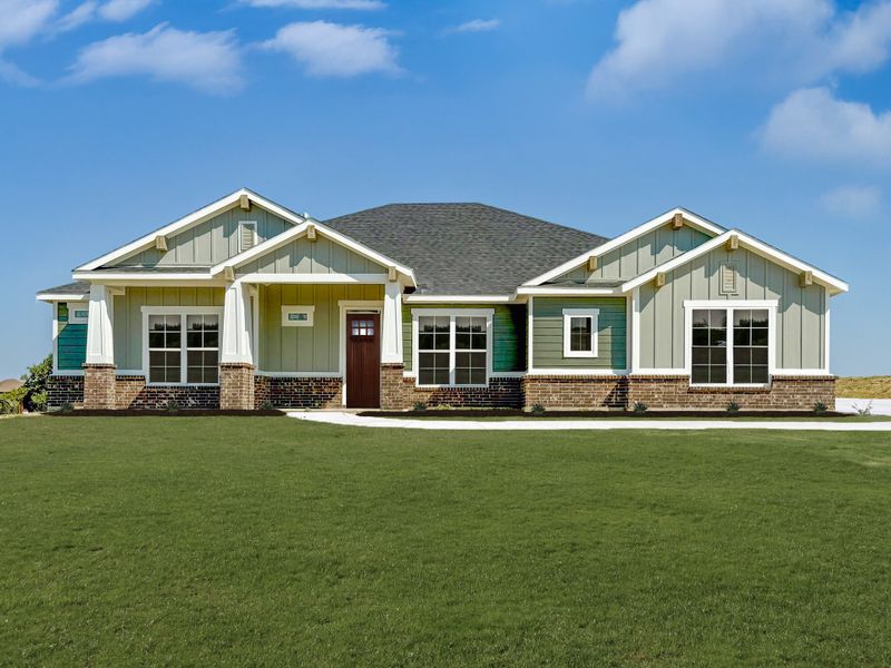 Front exterior of a new home in Rocky Top Ranch, Reno, TX, highlighting curb appeal (Image 1). Front exterior of a new home in Rocky Top Ranch, Reno, TX, highlighting curb appeal (Image 1).
