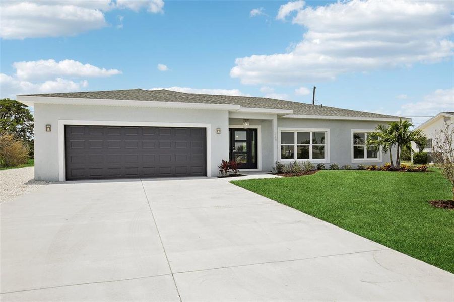 Front exterior of a new home in , Sun City Center, FL, highlighting curb appeal (Image 24).