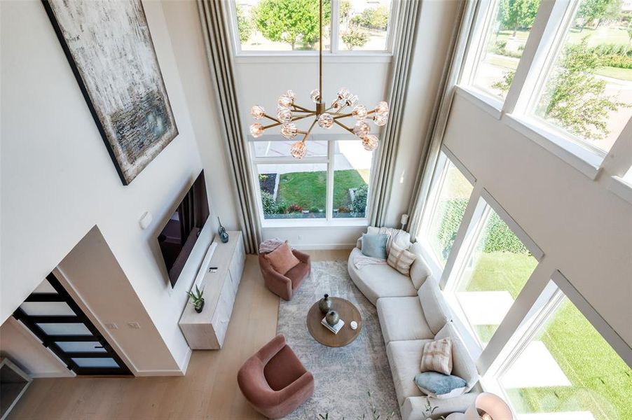 Dramatic view from 2nd floor to 1st floor living room.