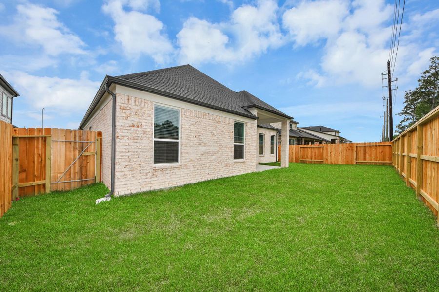 Backyard retreat, offering an abundance of space for kids to play and explore. The possibilities are endless in this outdoor haven, where the joy of open-air activities and family gatherings awaits.