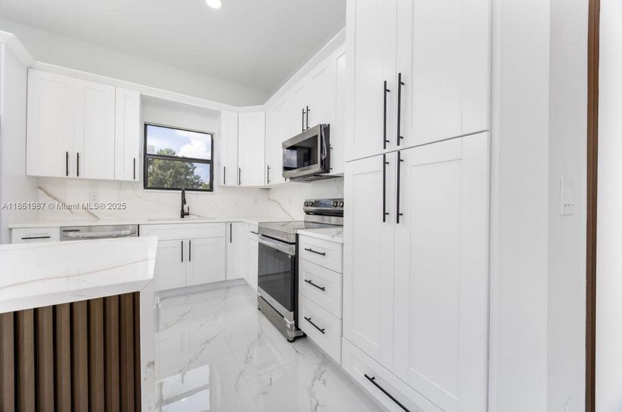 Furnished interior view inside a new home in , Lehigh Acres (Image 7). Furnished interior view inside a new home in , Lehigh Acres (Image 7).