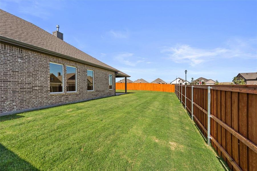 Exterior details and patio area of a home in Morningstar, Aledo (Image 17). Exterior details and patio area of a home in Morningstar, Aledo (Image 17).