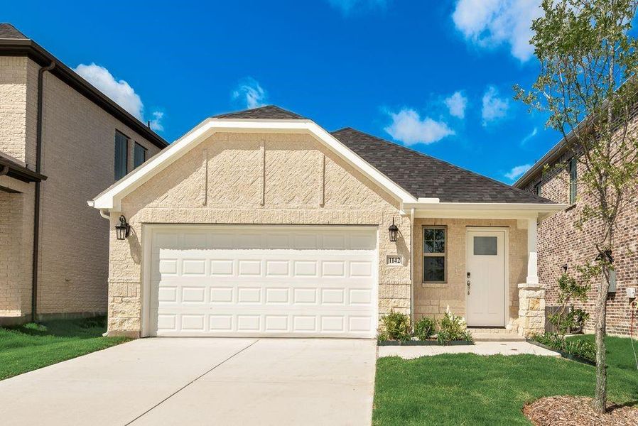 Front exterior of a new home in Walden Pond, Forney, TX, highlighting curb appeal (Image 20). Front exterior of a new home in Walden Pond, Forney, TX, highlighting curb appeal (Image 20).