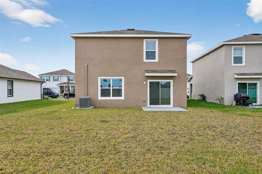 Exterior details and patio area of a home in Farm at Varrea, Plant City (Image 4).