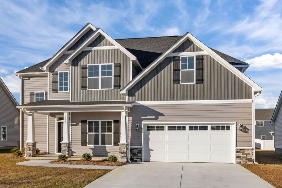 Front exterior of a new home in Arbor Hills South II, Greenville, NC, highlighting curb appeal (Image 22). Front exterior of a new home in Arbor Hills South II, Greenville, NC, highlighting curb appeal (Image 22).
