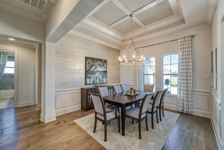 Dining Room with Coffered Ceiling with Crown Molding