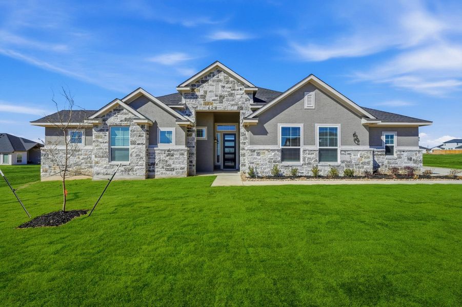 Representative exterior photo of a completed home built from the Mackenzie by Chesmar Homes in Sienna Lakes, San Antonio, TX (Image 15).
