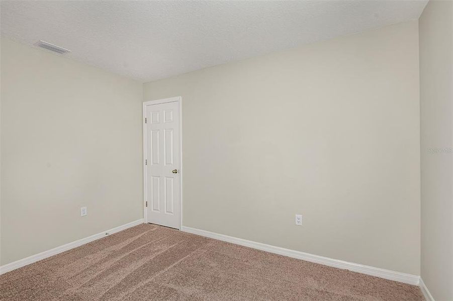 Spacious, unfurnished interior of a new home in Scenic Terrace, Haines City (Image 19).