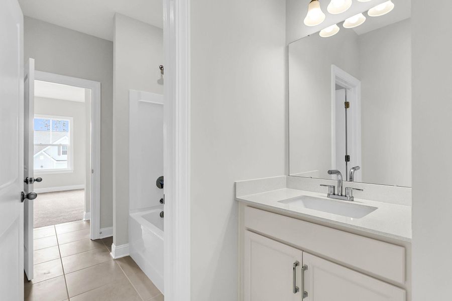 Furnished interior view inside a new home in Tidewater at Lakes of Cane Bay, Summerville (Image 15).