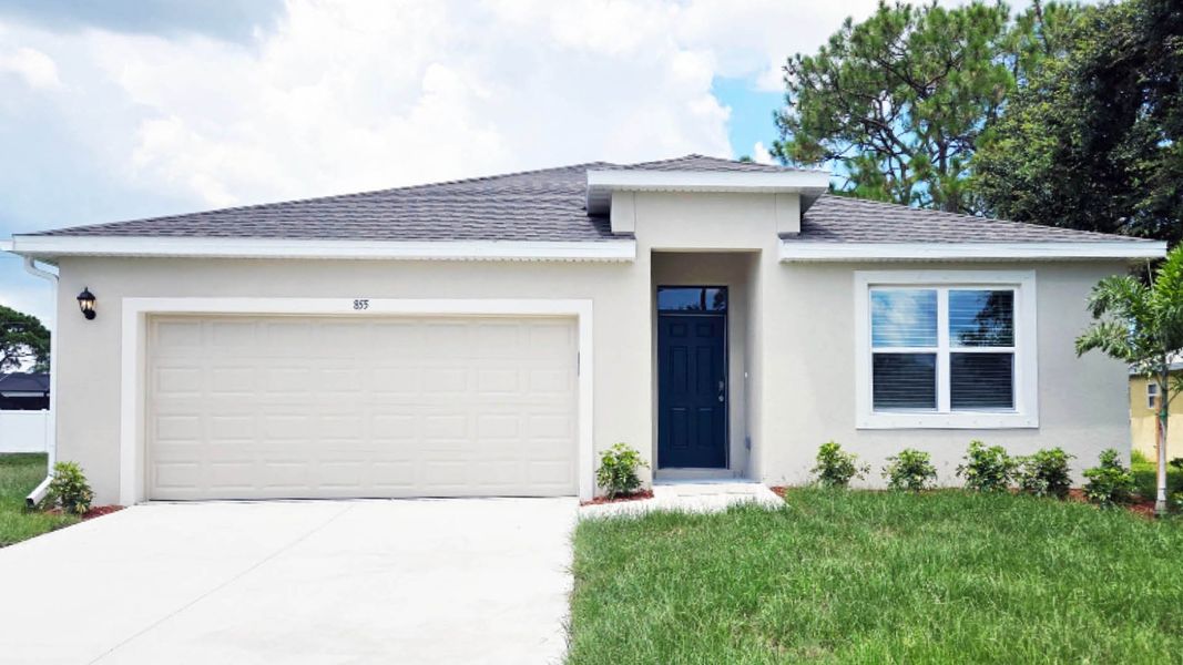 Front exterior of a new home in Palm Bay, Palm Bay, FL, highlighting curb appeal (Image 1).