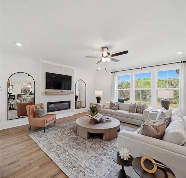 A refined living space offers hardwood floors and A refined living space offers hardwood floors and