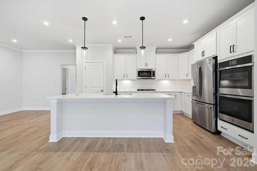 Example Photo Example Photo