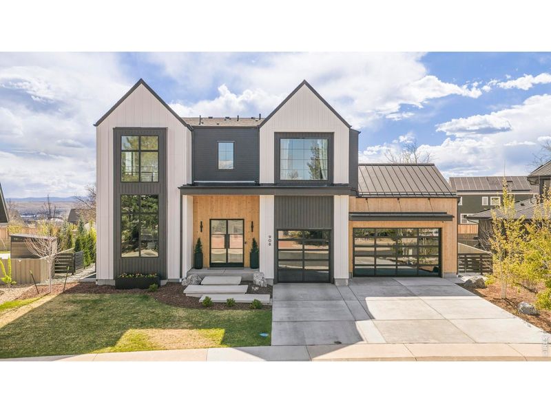 Front exterior of a new home in , Louisville, CO, highlighting curb appeal (Image 2).