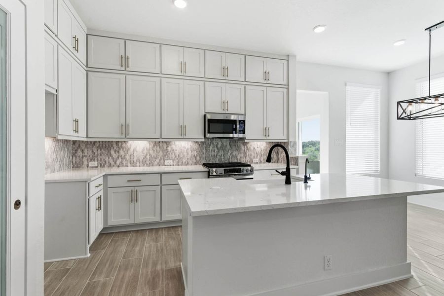Furnished interior view inside a new home in Centero at Stone Oak, San Antonio (Image 8).