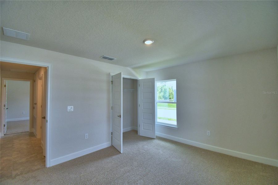 Spacious, unfurnished interior of a new home in Cadence Crossing, Auburndale (Image 21).