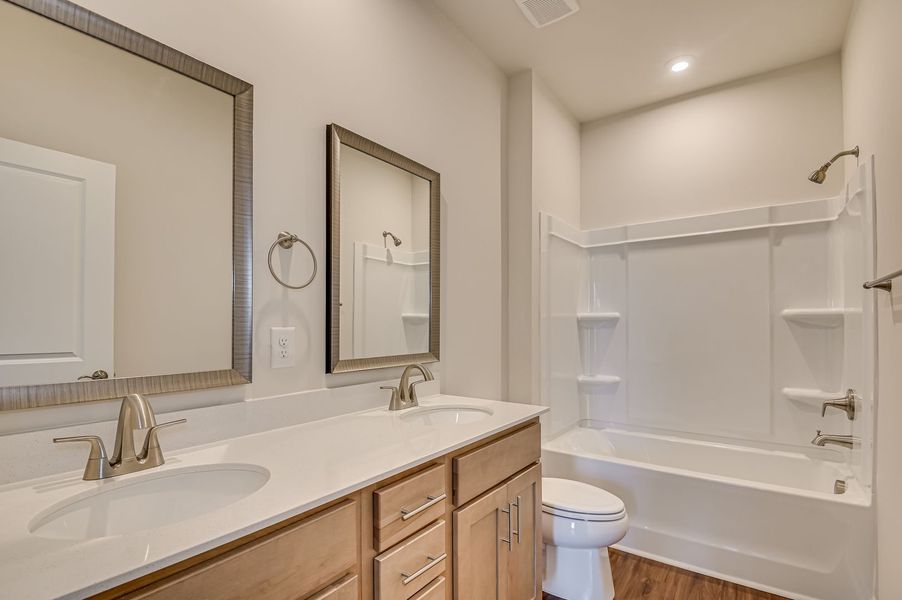Furnished interior view inside a new home in The Beacon at Old Peachtree Single Family Homes, Lawrenceville (Image 8).