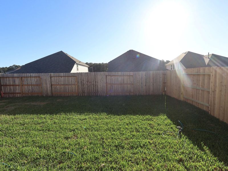 Exterior details and patio area of a home in Lone Star Landing, Montgomery (Image 8).