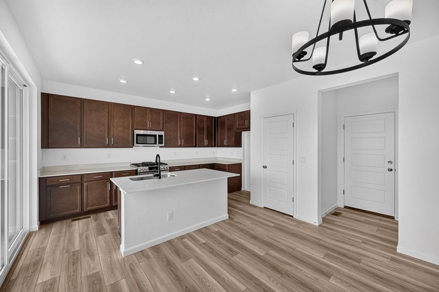Furnished interior view inside a new home in The Aurora Highlands, Aurora (Image 5).