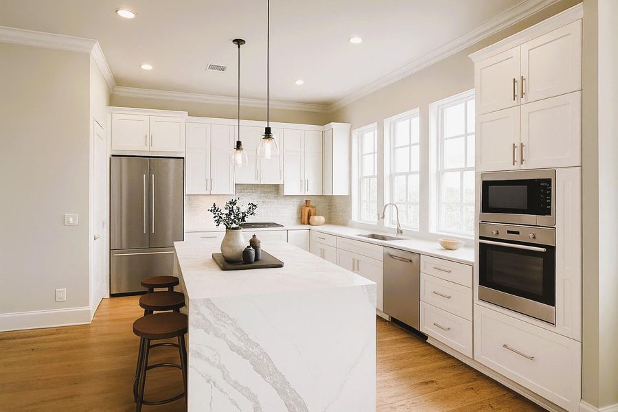 This Kitchen Cooks! - Huge Island w/ Waterfall Edge, Stacked Kitchen Cabinets to Show off those 12FT ceilings (Pic was virtually staged - appliances are not installed yet) This Kitchen Cooks! - Huge Island w/ Waterfall Edge, Stacked Kitchen Cabinets to Show off those 12FT ceilings (Pic was virtually staged - appliances are not installed yet)