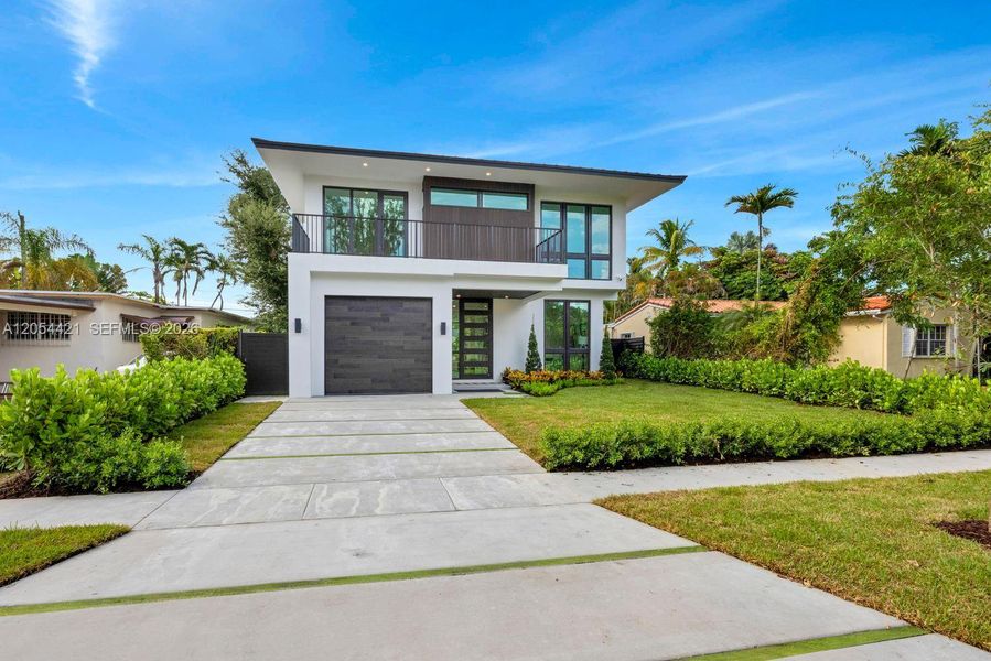 Front exterior of a new home in , Miami, FL, highlighting curb appeal (Image 26).