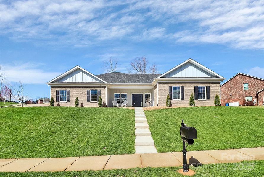 Front exterior of a new home in , Rock Hill, SC, highlighting curb appeal (Image 30).