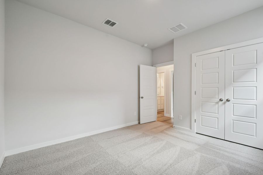 A room with white doors.