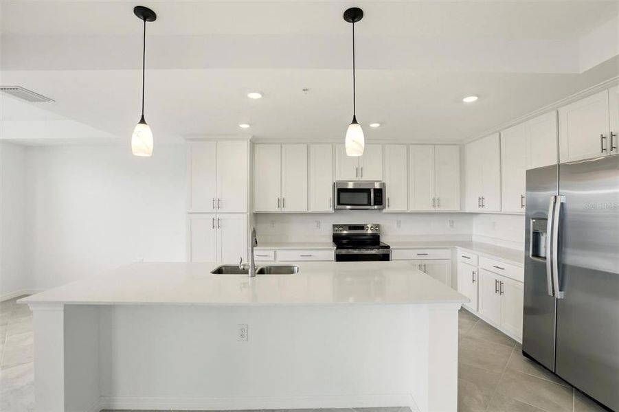 Furnished interior view inside a new home in , Lehigh Acres (Image 11). Furnished interior view inside a new home in , Lehigh Acres (Image 11).