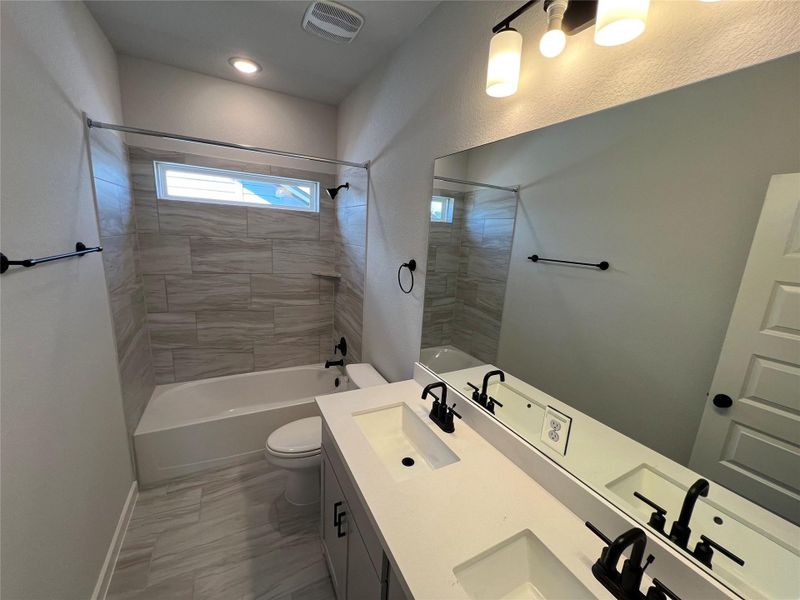 Furnished interior view inside a new home in Cascades at Onion Creek, Austin (Image 8).