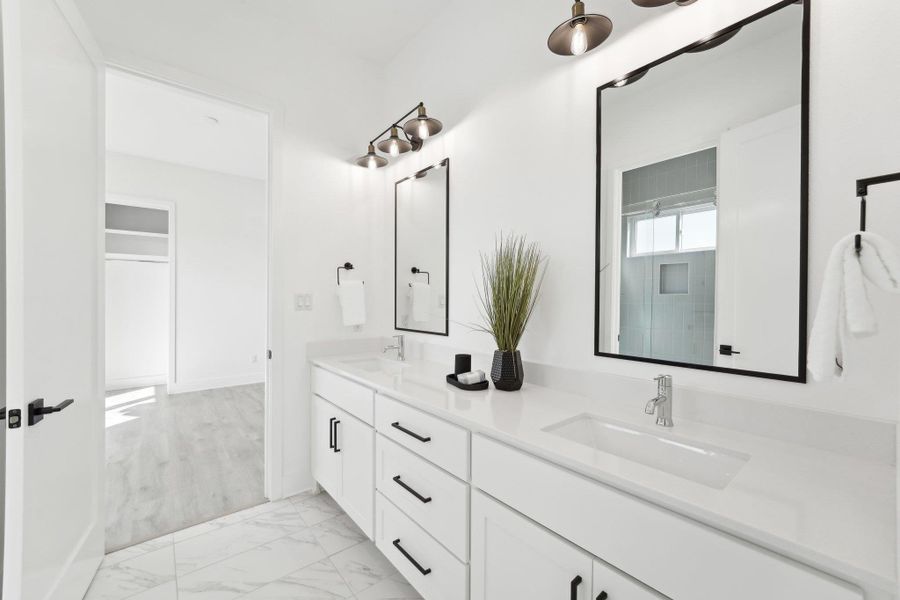 Elegant finishes and generous space define every bathroom in this home. Elegant finishes and generous space define every bathroom in this home.