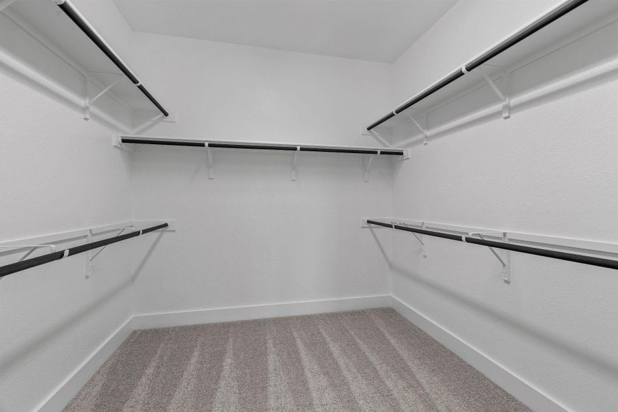 Walk-in closet in Primary Bedroom