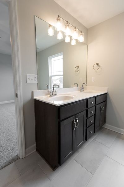 Representative furnished interior of a home built from the Dalton by Parkside Builders in The Woods, Gallatin (Image 12).