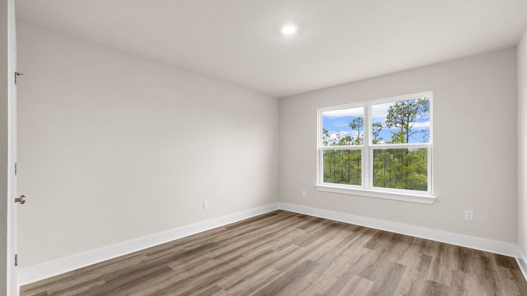 Representative unfurnished interior of a home built from the The Monroe by D.R. Horton in WindMark Beach, Port Saint Joe (Image 32).