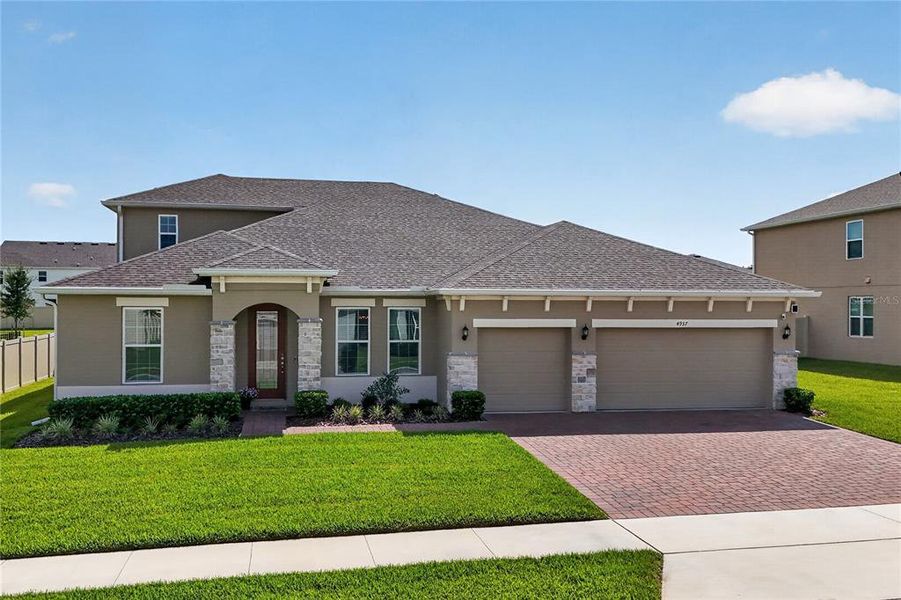 Front exterior of a new home in , Mount Dora, FL, highlighting curb appeal (Image 2). Front exterior of a new home in , Mount Dora, FL, highlighting curb appeal (Image 2).