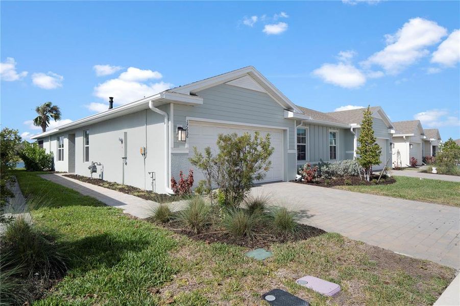 Front exterior of a new home in , Punta Gorda, FL, highlighting curb appeal (Image 23). Front exterior of a new home in , Punta Gorda, FL, highlighting curb appeal (Image 23).