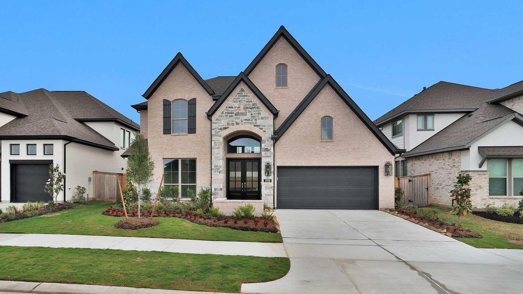 Front exterior of a new home in Bridgeland, Cypress, TX, highlighting curb appeal (Image 2).