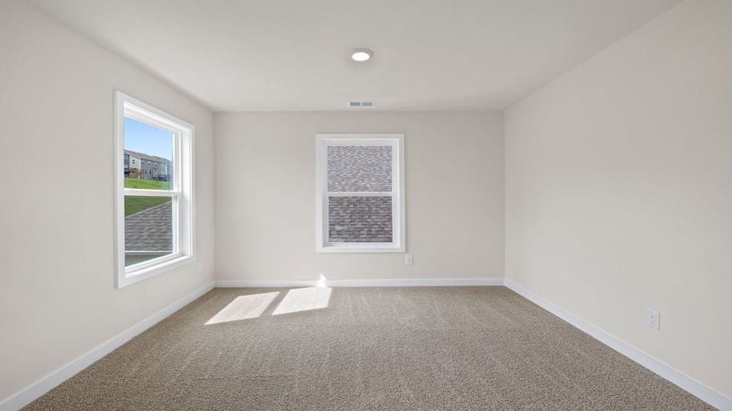Spacious, unfurnished interior of a new home in Adams Glen, Greenville (Image 27).