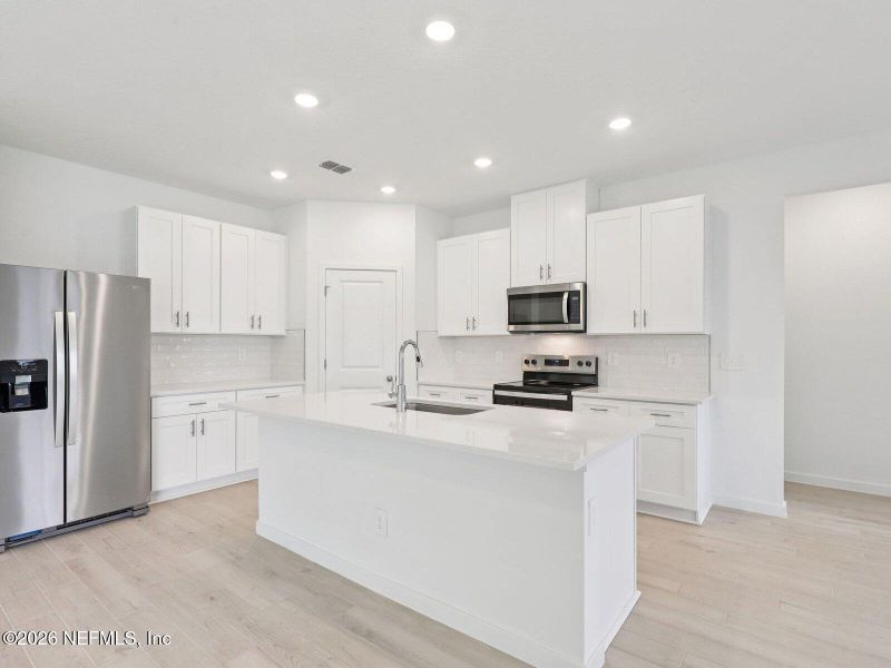 Furnished interior view inside a new home in Cypress Meadows - Signature Series, Jacksonville (Image 3).