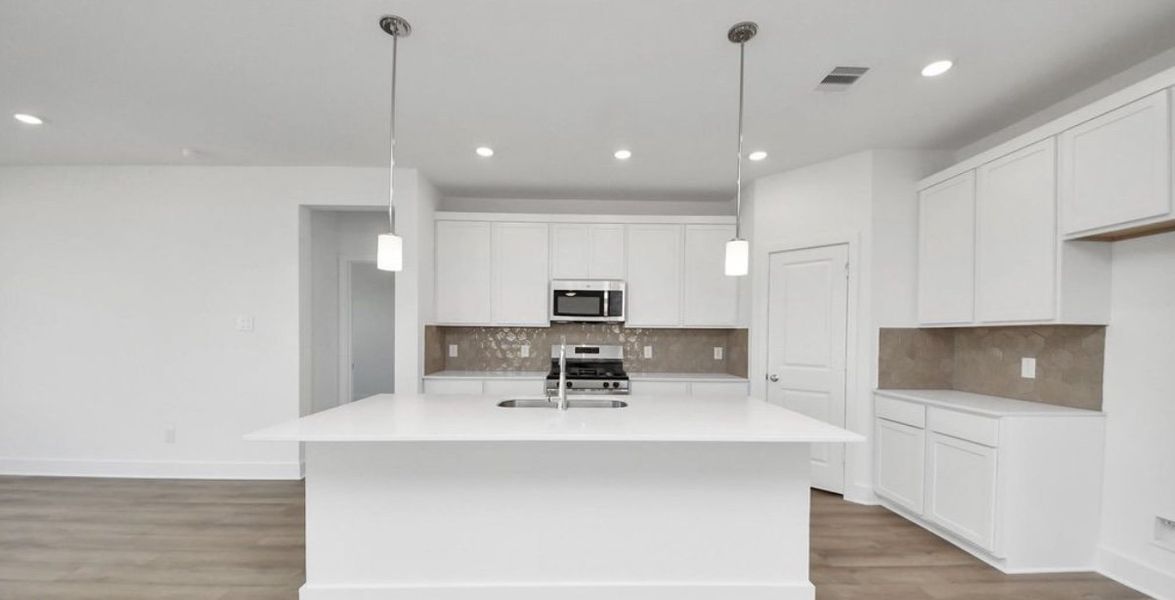 Furnished interior view inside a new home in The Canopies, Splendora (Image 4).