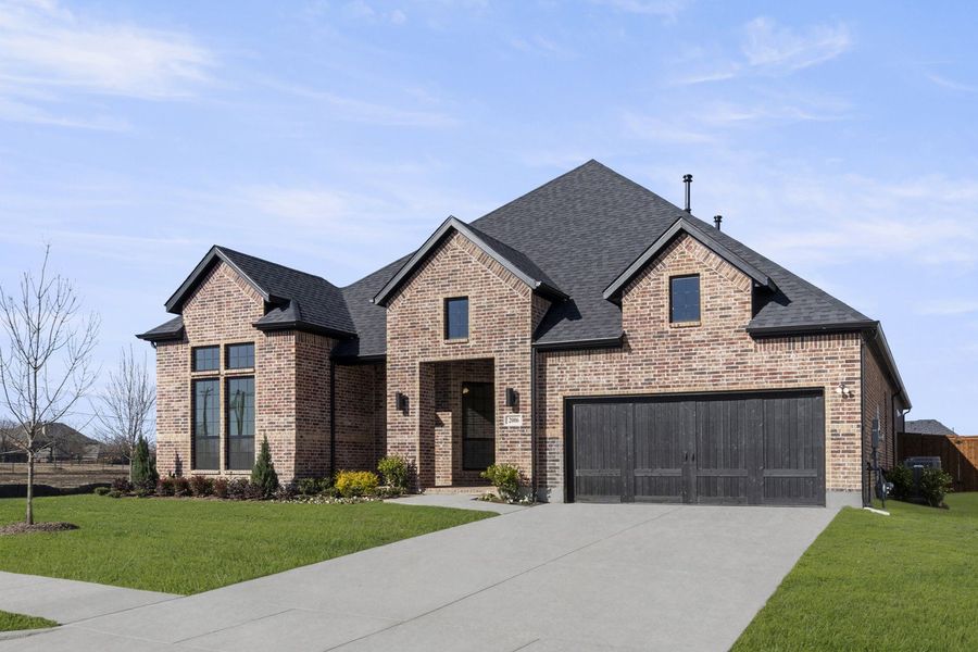 Front exterior of a new home in Nelson Lake Estates, Rockwall, TX, highlighting curb appeal (Image 2). Front exterior of a new home in Nelson Lake Estates, Rockwall, TX, highlighting curb appeal (Image 2).