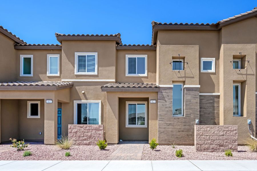 Front exterior of a new home in Reserve at Gum Springs, Clute, TX, highlighting curb appeal (Image 1). Front exterior of a new home in Reserve at Gum Springs, Clute, TX, highlighting curb appeal (Image 1).
