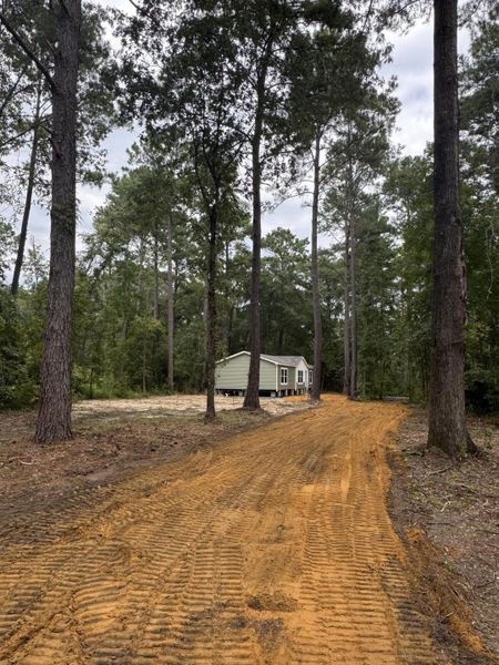 Front exterior of a new home in , Round O, SC, highlighting curb appeal (Image 10).