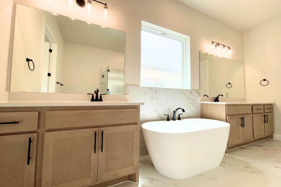 Furnished interior view inside a new home in Whisper Valley, Manor (Image 14).